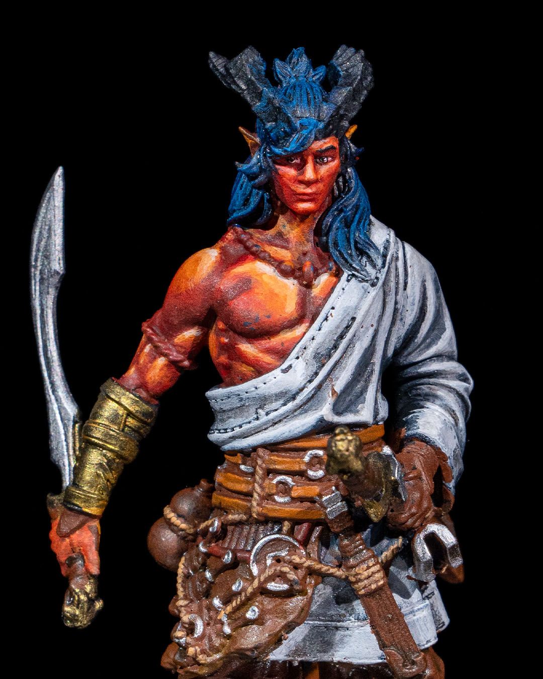 Painted Tiefling Fighter miniature with dual swords featured in dynamic fantasy setting, perfect for tabletop RPGs. | Helios Tabletop