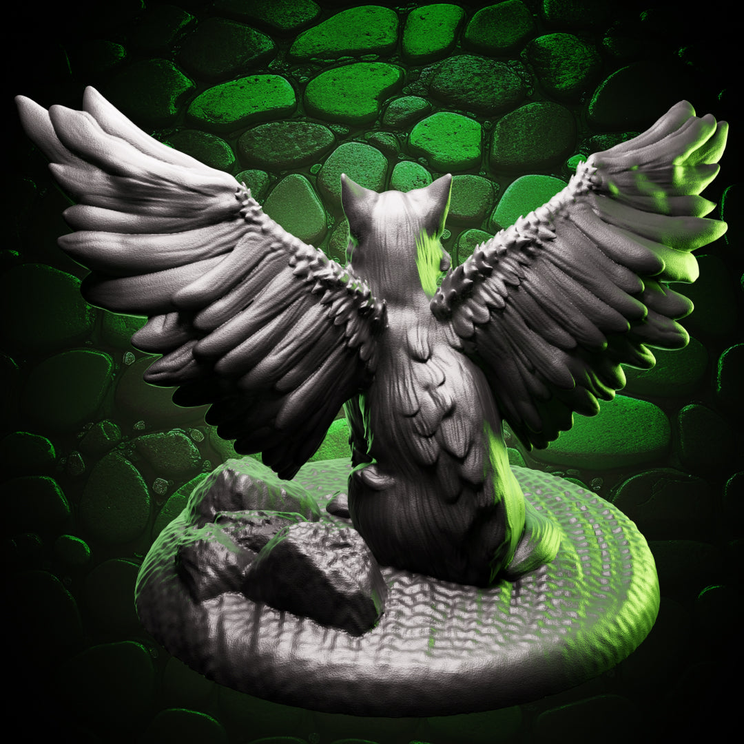 Back view of winged cat familiar miniature with feathered wings extended, sitting on a rock base – Tressym mini for tabletop RPGs.