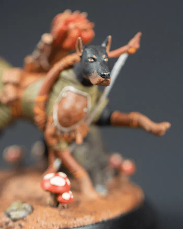 Close up on archer dogs face. Painted like a Dobermann