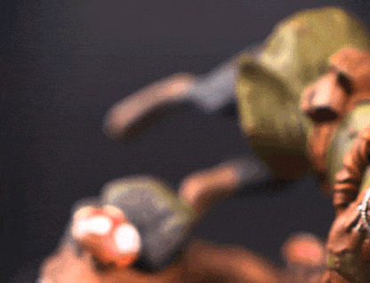 Dobermann dog dressed like an archer on a rotating base showcasing its skills