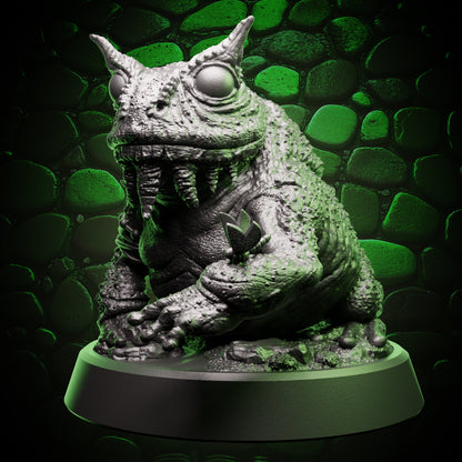 Front view of giant toad familiar miniature with wide eyes, textured skin, and seated stance – fantasy RPG resin mini.