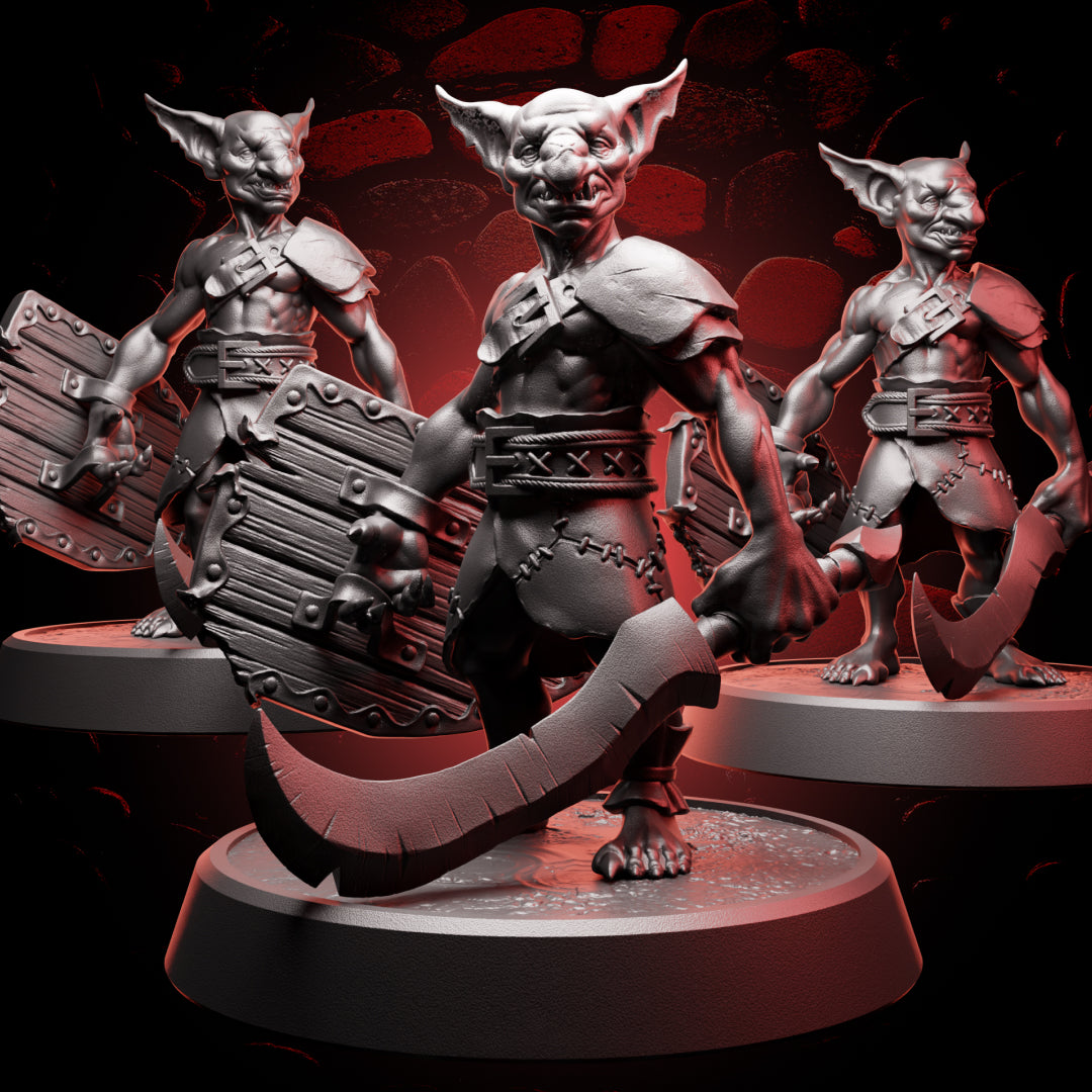 Front angle of Goblin Fighter Warband miniatures showing detailed faces, swords, and shields