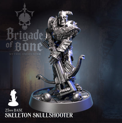 A metallic silver miniature figurine of a skeletal archer warrior on a round base, shown against a dark blue and gray background with 'Brigade of Bone' branding and product text.