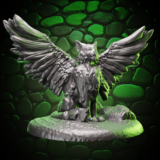 Tressym familiar miniature with wings spread wide, perched on a rock base, front view.