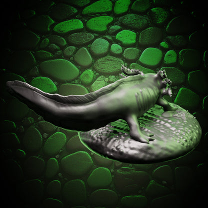 Side view of Axolotl Familiar miniature displaying its base sculpt and amphibious body design.
