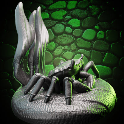 Angled view of Crab Familiar miniature showing armored claws and base design