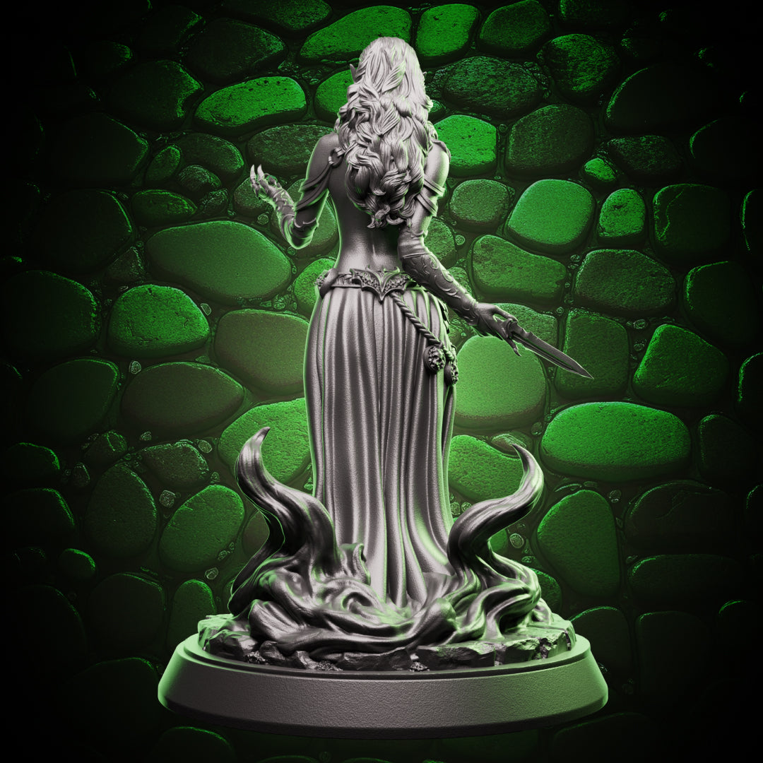 Back view of the Elf Warlock miniature with flowing robes and swirling magical aura