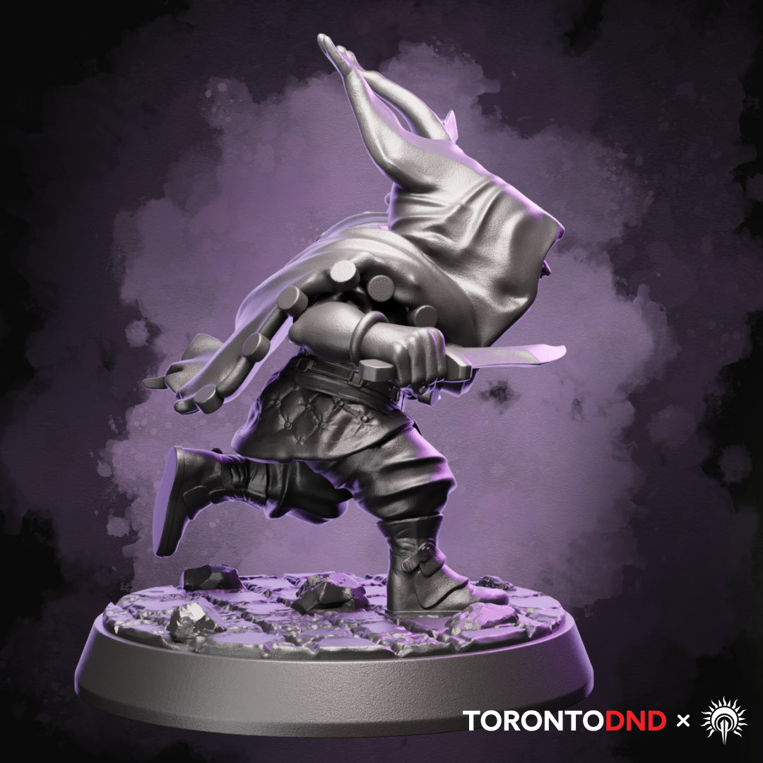 Right side view of a high-quality resin Halfling Rogue miniature emphasizing weapon angles and dynamic running posture