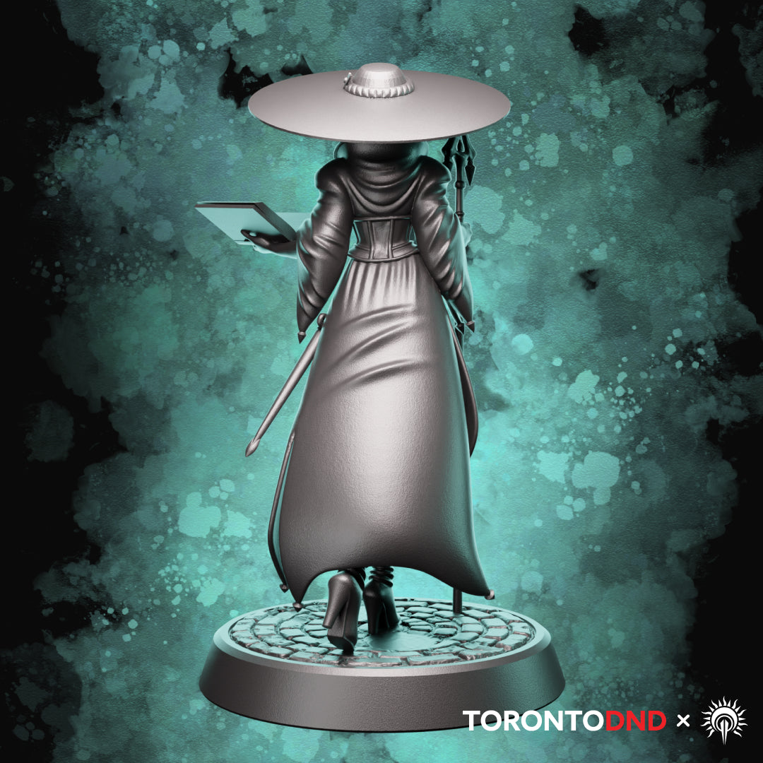 Rear view of a Human Wizard miniature showcasing robe flow, hat brim, and overall silhouette