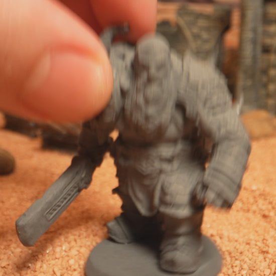 360-degree turntable video of a 32mm Dwarf Fighter miniature showcasing full armor detail, rune-inscribed greatsword, and rugged dwarven features from all angles.