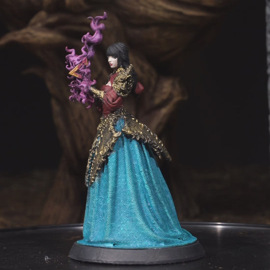 360-degree turnaround of Human Sorcerer miniature with prism focus and flowing robes, detailed resin spellcaster model for D&D and tabletop RPGs.