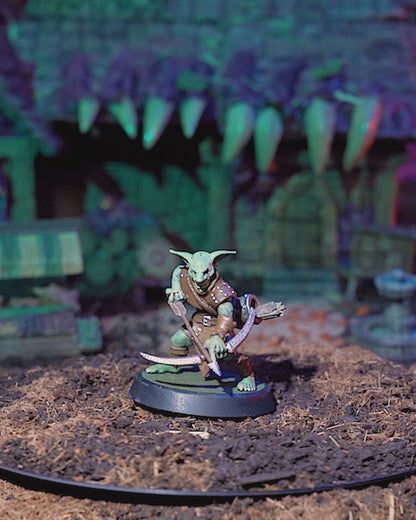 360-degree view of painted Goblin Archer miniature with bow, and expressive goblin features.