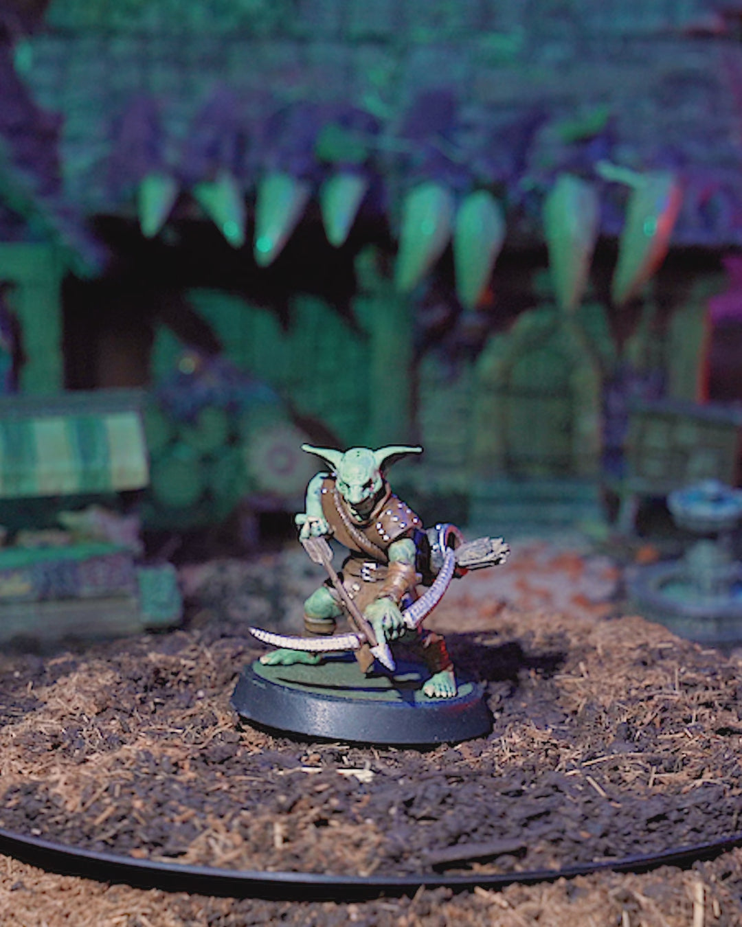 360-degree view of painted Goblin Archer miniature with bow, and expressive goblin features.